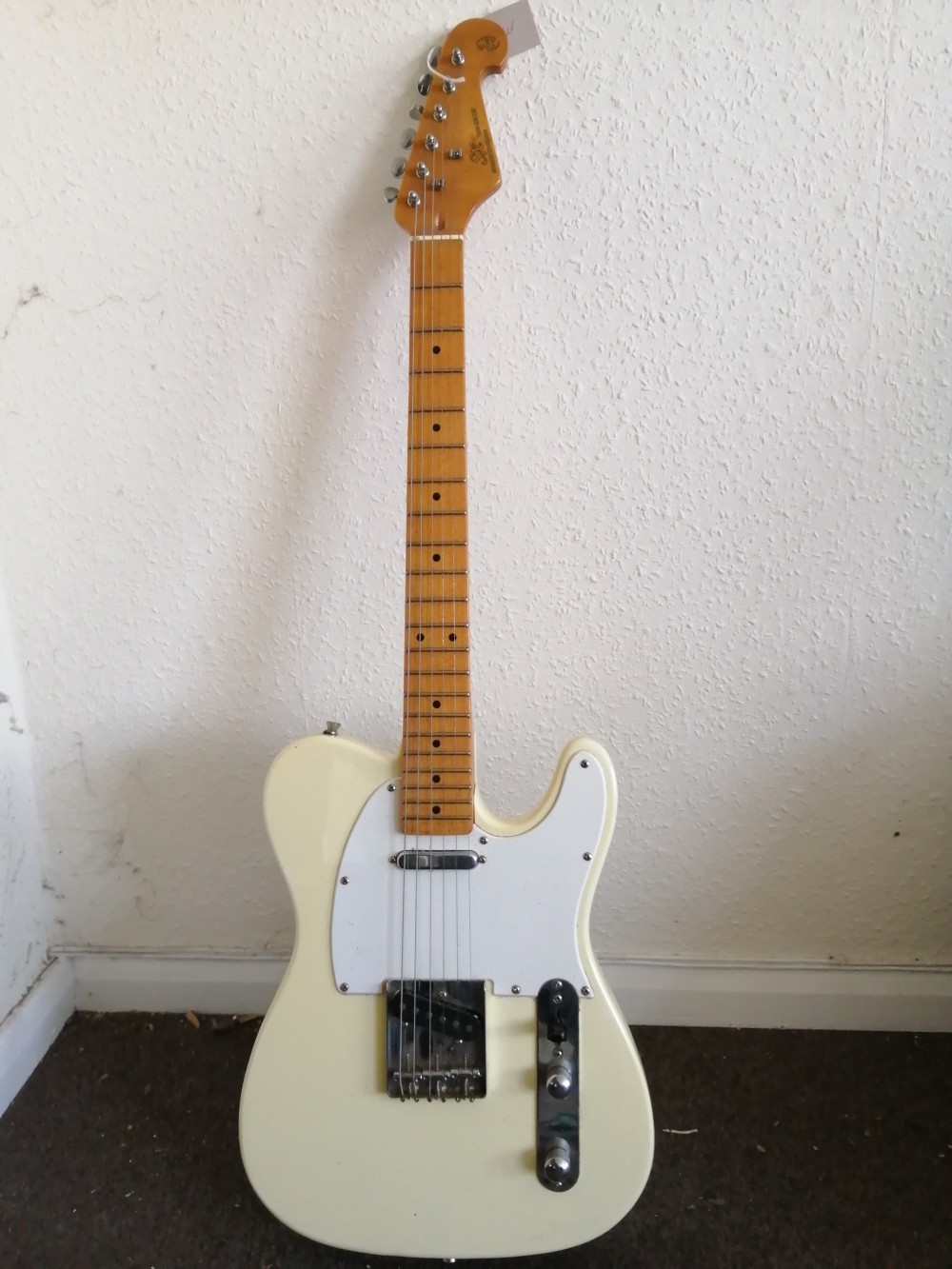 An SX VTG series electric guitar